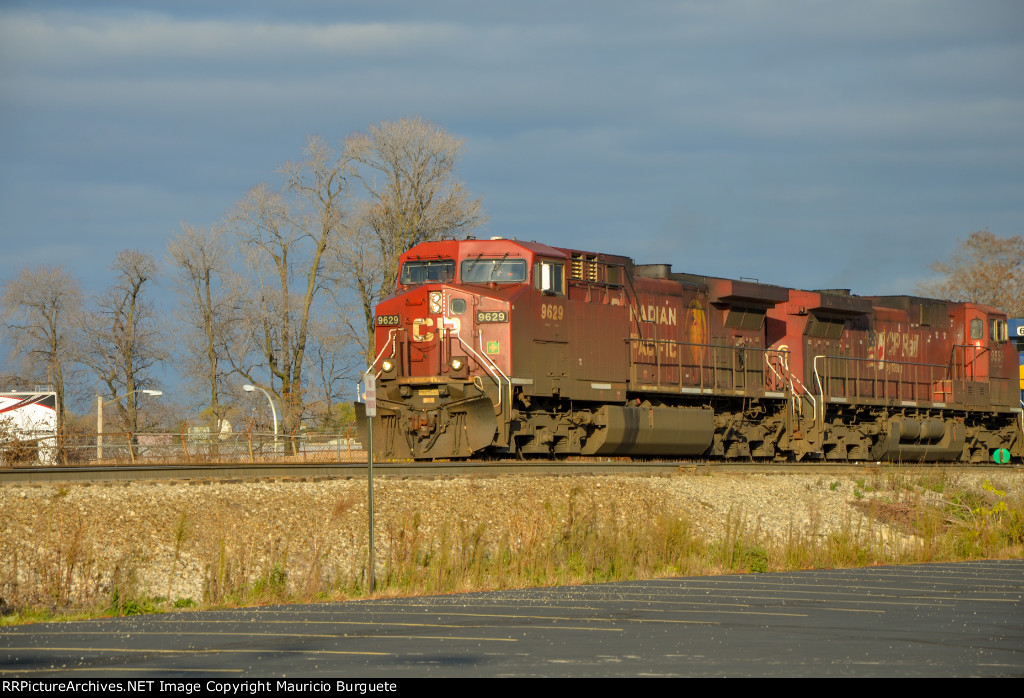 CP AC44CW Locomotives leading a train